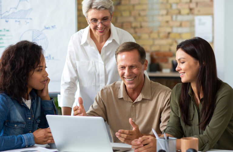 Horizon road leading toward a rising sun
