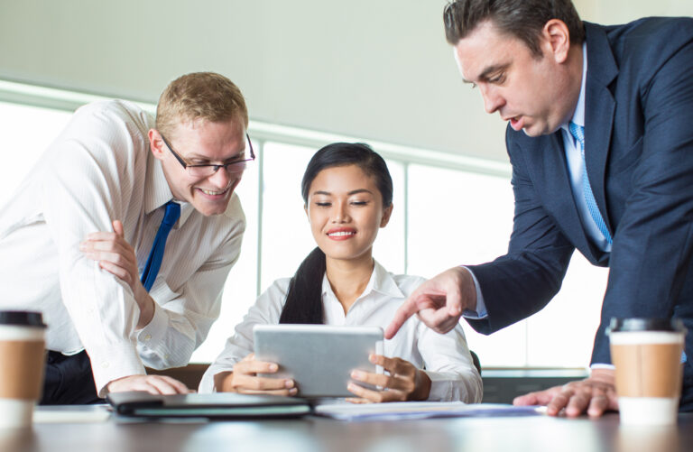 Two interlocking gears linked by circuit traces